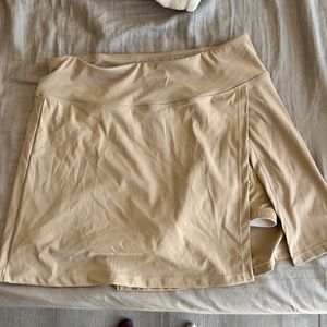 Baleaf skirt with shorts under with a pocket size large beige